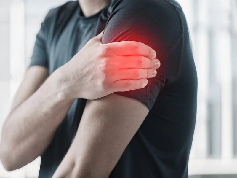 Camel City Chiropractic treating arm pain in Hudsonville