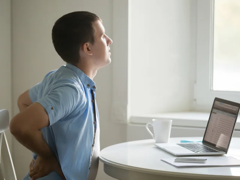 Camel City Chiropractic treating back pain in Hudsonville